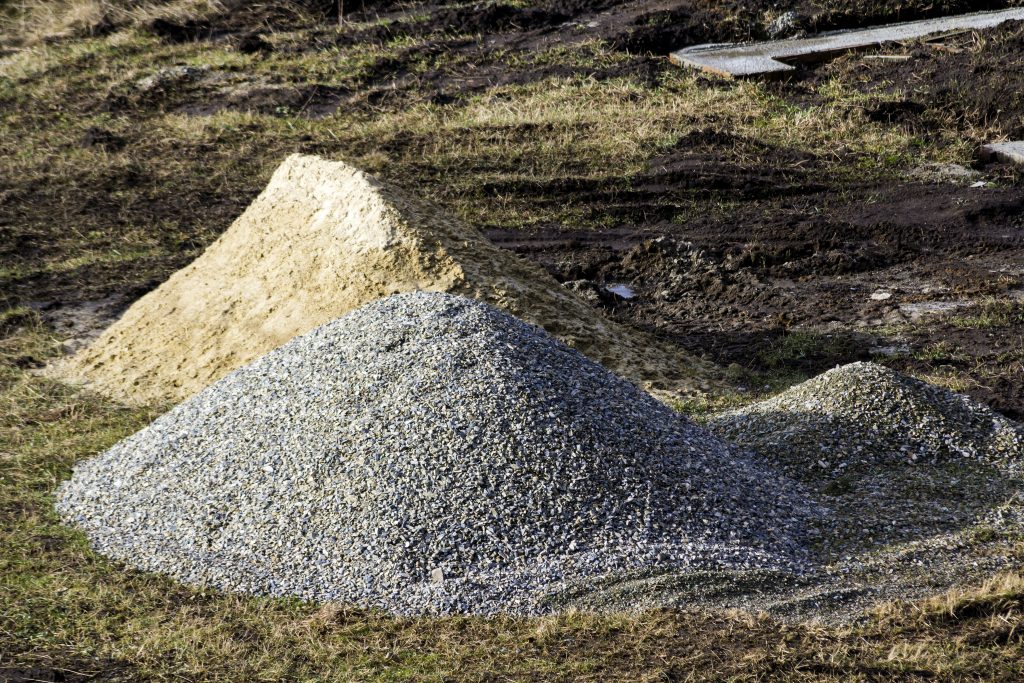 sand and rock piles to move